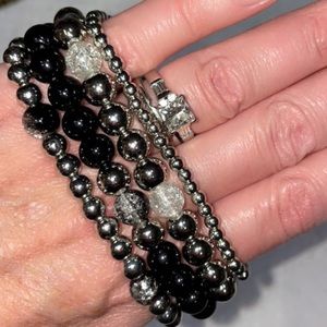 Stackable bead bracelets. Set of 4. Black, silver, clear… handmade by my 8yr old